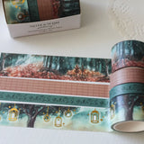 This enchanted forest washi tape gift set is designed for dreamers, storytellers, and stationery lovers who enjoy woodland walks at dusk. Featuring hand-painted watercolour forest scenes by Rebecca. Perfect for journaling and anyone who loves bringing the beauty of the British countryside into their creative projects.

30mm x 5m - Forrest
25mm x 5m with gold foil - Lanterns
5mm x 5m - Foliage
10mm x 5m - grid