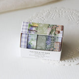 This beautiful washi tape gift set is designed for journalers, nature lovers and stationery lovers who find beauty in the quiet corners of the British countryside. Featuring original watercolour paintings by Rebecca, this set is inspired by walks through a bluebell wood and a secret garden in full bloom.&nbsp;

The two designs included:

Bluebell Woods — a hand-painted watercolour scene of a bluebell wood - 15mm x 5m
Secret Garden — a beautiful cottage and garden scene, hand-painted in soft watercolours - 2