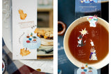 Welcome to the Tea Room! This kiss-cut PET Tape features a relaxing teahouse filled with cats and other furry friends. It adds the perfect touch of warmth to your journal pages with hints of golden brown and dark blue as conversations continue until midnight.