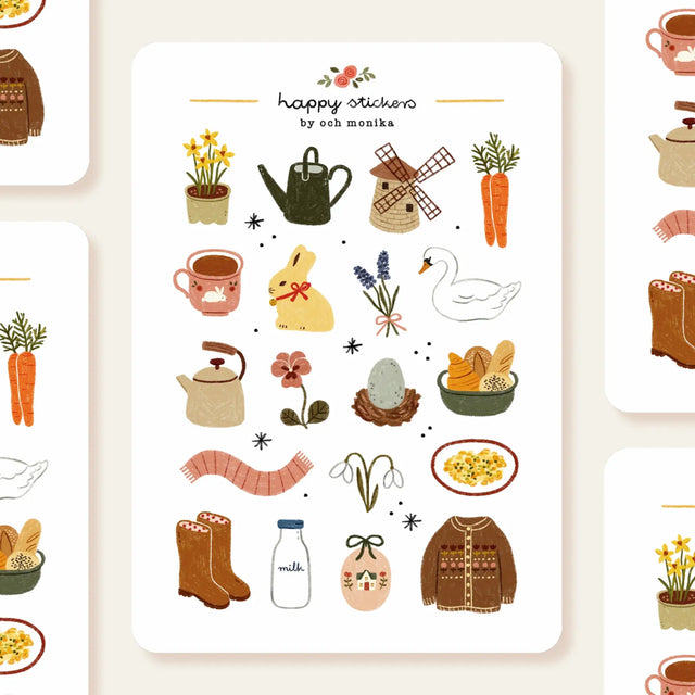 A matte paper sticker sheet filled with cozy, hand-drawn illustrations, perfect for planners, journals, or scrapbooking. It features a cozy spring and hygge season theme, making it a perfect fit for mindful living enthusiasts. All designs are lovingly created by Monika Szczerbińska.