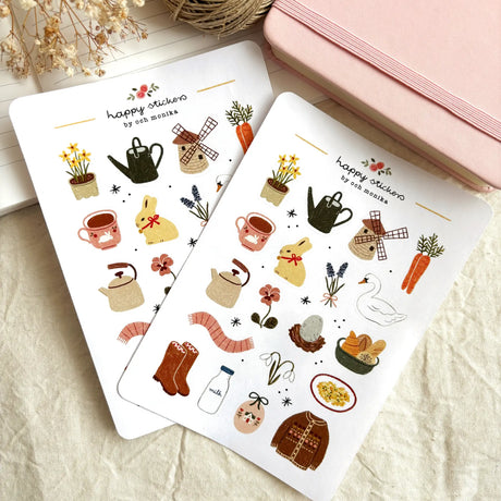 A matte paper sticker sheet filled with cozy, hand-drawn illustrations, perfect for planners, journals, or scrapbooking. It features a cozy spring and hygge season theme, making it a perfect fit for mindful living enthusiasts. All designs are lovingly created by Monika Szczerbińska.