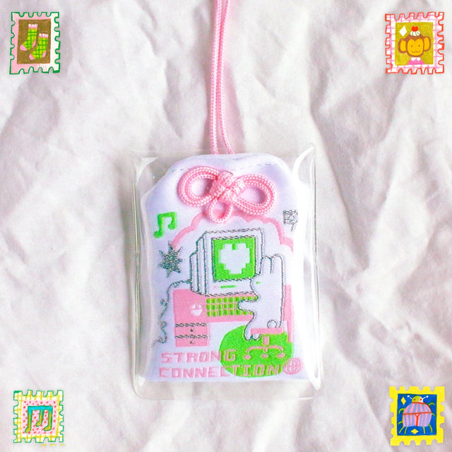 2x2.5 omamori charm with a 8 inch string.

An omamori is a Japanese charm that provides protection and luck!