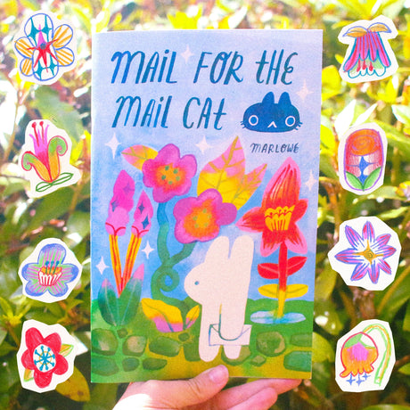 Odd Rabbits - Mail for the Mail Cat Zine

28 page, 8.5x5.5 inch full color zine!

Tells the story of Maebee the mail cat, and Bean's journey to deliver the mail!

Minor misalignment or smudges are not considered to be b-grade.&nbsp;