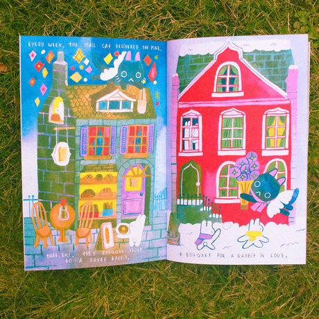 Odd Rabbits - Mail for the Mail Cat Zine

28 page, 8.5x5.5 inch full color zine!

Tells the story of Maebee the mail cat, and Bean's journey to deliver the mail!

Minor misalignment or smudges are not considered to be b-grade.&nbsp;