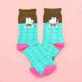 Pudding cotton knit socks. Great way to add some fun to any outfit!

One size ~ fits US women's size 6-11.

Socks come in a plastic sleeve with a paper band.&nbsp;
