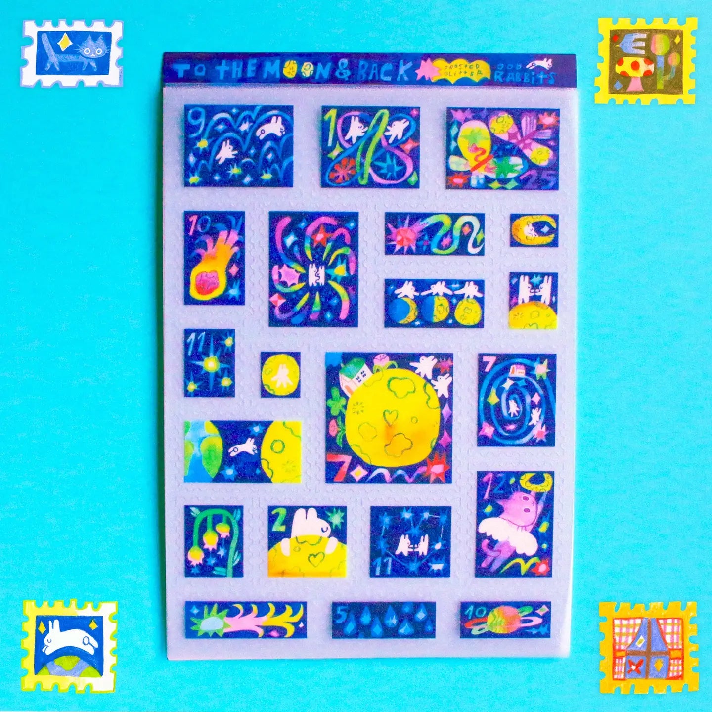 'To the Moon &amp; Back' Frosted Glitter Transparent A6 Sticker Sheet. Stickers are stamp shaped and have a clear blue background.

Not waterproof.
Do not place in areas of high wear (laptops, phone cases, water bottles, etc).
Sticker sheets come packaged in a plastic sleeve.