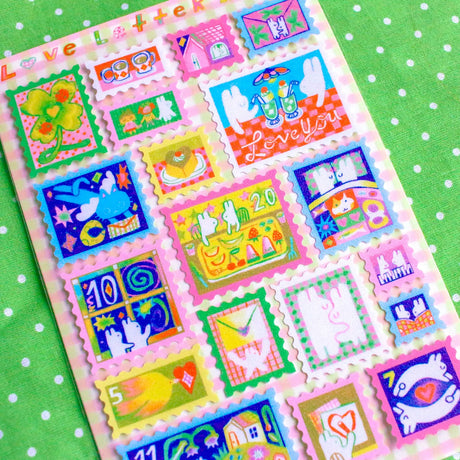 'Love Letter' Frosted Glitter A6 Sticker Sheet.

Not waterproof.
Do not place in areas of high wear (laptops, phone cases, water bottles, etc).
Stickers come in a plastic sleeve.