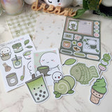 Bring a cozy, calming vibe to your creative projects with the Once More With Love Journaling Kit – Matcha Time. Perfect for planners, scrapbookers, and journal lovers, this kit blends adorable artwork with thoughtfully curated ephemera to help you craft spreads that feel warm, whimsical, and full of personality. 