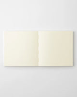Open MD Notebook Thick A5 Square displaying blank, fountain‑pen‑friendly Midori MD pages.