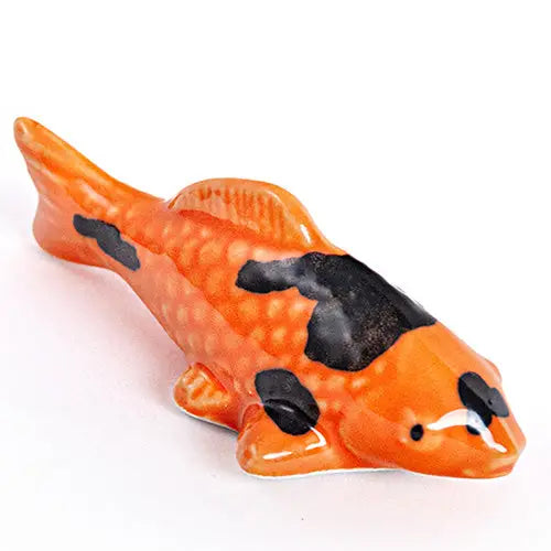 Orange Japanese Koi Fish Rest

These cute ceramic rests are a perfect stationery addition to your desk! Use them for pens, paint brushes, or take them to your kitchen as a chopstick rest!

Size: 2"
Material: Ceramic
Weight:1.6 oz (45.36 g)
Origin: China