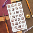 STICKII - Ornate Alphabet Sticker Sheet

✒️📜 Add a touch of old-world elegance to your pages with this ornate alphabet sheet. Inspired by gothic lettering, vintage monograms, and illuminated manuscript details, each letter is full of curling flourishes and antique charm. Perfect for spelling out initials, decorating journal pages, labeling letters, or giving any paper project the feeling of something pulled from a beautifully aged book.

Top Coating: None
Adhesive Layer: Paper
Backing Layer: Paper
6.69" x 