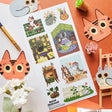 📚🐈 Tucked between cozy rooms, leafy corners, and pages waiting to be explored, @havenpeckover’s curious cats are keeping very busy! These creative kitties paint portraits, curl up with books, play with yarn, tend to their plants, and settle in for quiet study sessions with tea and cookies. A charming little sheet for anyone who believes work is better with a cat nearby, and play is basically required between chapters.

Art by: @havenpeckover