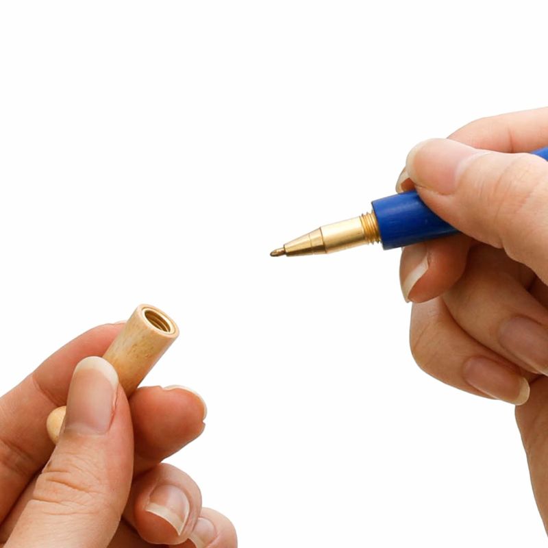 A wooden baseball bat pen by Penco. The bat handle acts as the cap, and the pen tip is made of brass.

Comes in black oil-based ink with 0.8mm tip.&nbsp;