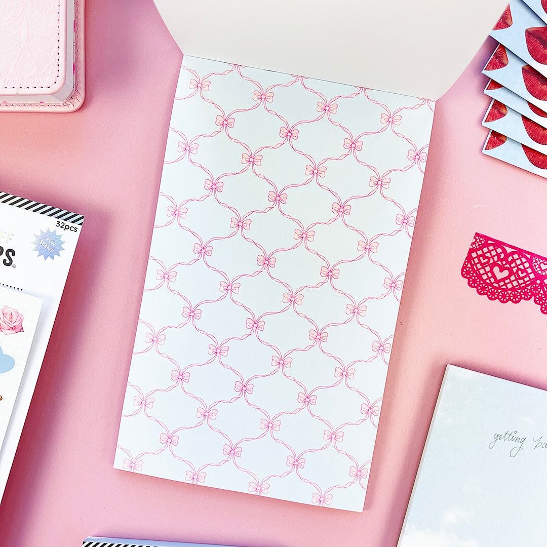 Sweet, nostalgic, and a little bit extra—in the best way. The Coquette Junk Journal Sticker Book is packed with all the pretty details your pages have been waiting for. Think bows, florals, frames, patterns, alphabets, and darling vintage-inspired bits made for layering, collaging, and documenting every little moment.