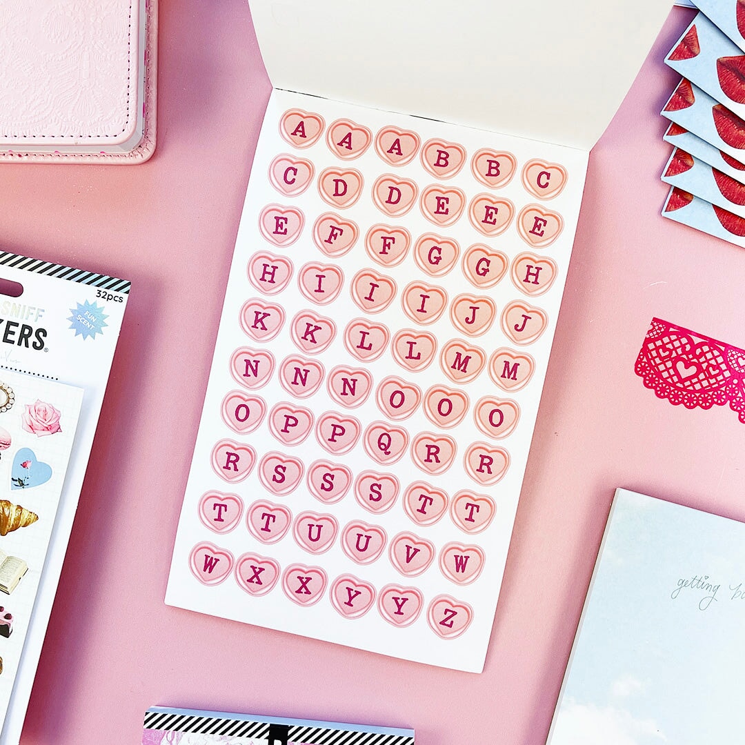 Sweet, nostalgic, and a little bit extra—in the best way. The Coquette Junk Journal Sticker Book is packed with all the pretty details your pages have been waiting for. Think bows, florals, frames, patterns, alphabets, and darling vintage-inspired bits made for layering, collaging, and documenting every little moment.