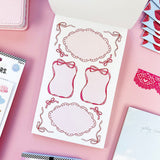 Sweet, nostalgic, and a little bit extra—in the best way. The Coquette Junk Journal Sticker Book is packed with all the pretty details your pages have been waiting for. Think bows, florals, frames, patterns, alphabets, and darling vintage-inspired bits made for layering, collaging, and documenting every little moment.