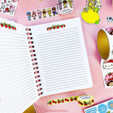 A tiny notebook with major main character energy 🍓💌 Covered in the sweetest strawberry + Hello Kitty details, it’s perfect for quick notes, doodles, and lists you’ll actually want to write. Small enough to toss anywhere, cute enough to show off everywhere.

A bright red spiral notebook featuring Hello Kitty sitting in a strawberry, framed with a white scalloped oval and tiny floral details 🍓 The smooth cover pops with bold color, while inside you’ll find lined pages with coordinating strawberry accents a
