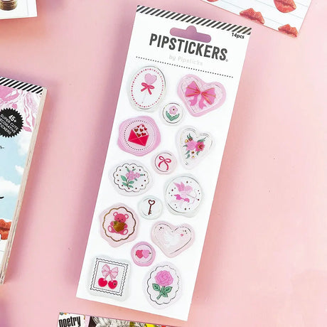 Add an extra bit of fun to your snail mail, invitations, thank you cards, gift tags, scrapbook or craft project! Wax Seal stickers look as cool as the real thing - without the mess! Just peel & stick - that's all!

Includes one 3" x 7" sheet of Seal Of Love Pipstickers.