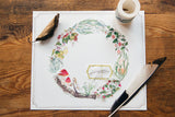 Plant some white sage, gather forest berries, and admire branches covered in gray-green lichen and wild mushrooms. Capturing the forest vibe of spring and summer is this Wild Wreath 2 Washi Tape.