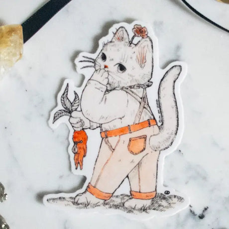 This sweet little kitty has found themself in a bit of a garden mishap. Illustrated in a whimsical pen-and-ink style with a soft vintage touch, “Oops Kitty” brings charm and a smile wherever it goes. Printed on durable white vinyl, this sticker is waterproof, UV-proof, and long-lasting — perfect for decorating water bottles, laptops, journals, or anywhere a touch of magic is needed.