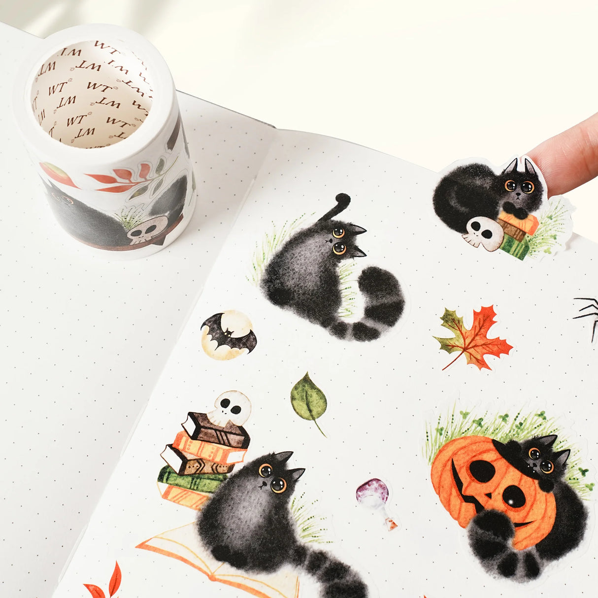 In collaboration with illustrator @better.call.liubka, we present a Halloween washi tape filled with the charm of black cats in motion. Every section tells a tiny story—cats leaping across pumpkins, sneaking through candles, or plotting playful tricks in the night. With bold lines and expressive details, this tape turns your journal into a stage for whimsical feline adventures.