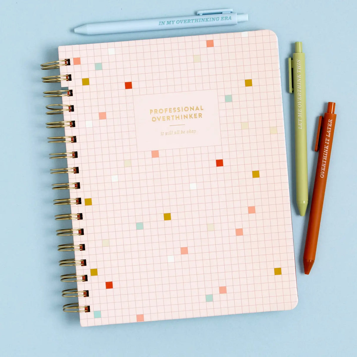 Stay organized and inspired with the Professional Overthinker Spiral Notebook! Featuring lined pages for all your thoughts, lists, and brainstorms, this 7” x 9” wire-bound notebook is perfect for journaling, note-taking, or planning your next big idea. The playful cover design makes it a great desk companion or a fun gift for students, writers, teachers, or anyone who loves to jot things down. Whether you’re tackling to-do lists or letting your creativity flow, this stylish and functional notebook is here t