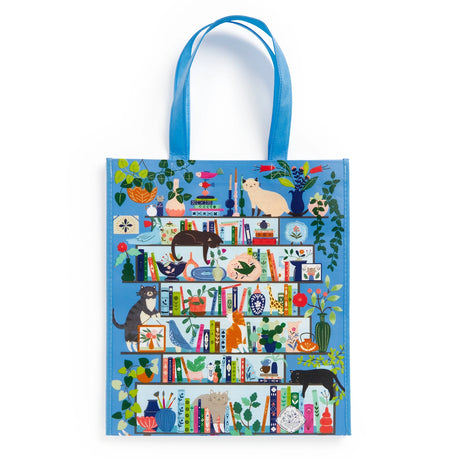 REUSABLE SHOPPING BAG – Our new Purrfect Nook reusable shopping bag features our new puzzle print of the lively, cozy shelfie made for bibliophiles while being stylish and eco-friendly. The bag is also spacious and roomy, with plenty of space to hold all your essentials. It's also lightweight and easy to carry, making it perfect for everyday use. This unique shopping bag is a great way to show off your style while also doing your part for the environment.