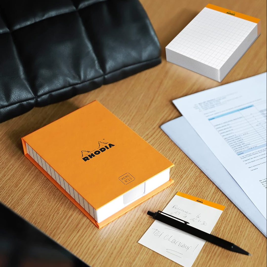 Beautiful, practical and functional, this Memo pad has it all. With its false air of a stapled block, it is always at hand on your desk.

Comes in a refillable protective box.

Size: 3 3/8" x 4 1/2"
Detachable Sheets: 240
Paper/Color: 80g/Ultra White
Fountain pen and marker friendly
Exceptionally smooth, acid-free, pH neutral
Cardboard backed, nonskid backing