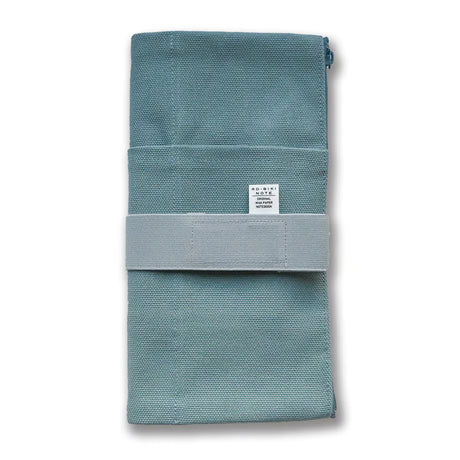 Made of cotton that feels good to the touch, this is RO-BIKI NOTE CANVAS COVER vintage blue. A zippered pocket on the side is useful for storing stationery that tends to be loose. It has a simple design that does not stand out when carrying. When closed, it feels neat and sizable. The surface of the cover has three pockets of different sizes, so you can enjoy multiple storage options.&nbsp;

With a connecting band, you can sandwich the Basic size and the passport size at the same time.
