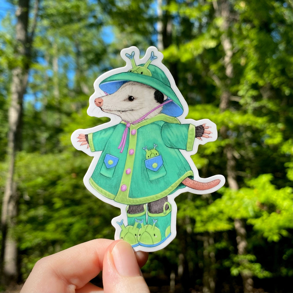 This weatherproof vinyl sticker features my illustration of a opossum dressed up in caterpillar rain gear.


This die-cut gloss 4” vinyl sticker is durable, weatherproof, and perfect for water bottles, notebooks, laptops, bikes, and all sorts of other surfaces! Make sure to clean and dry the surface thoroughly before applying.