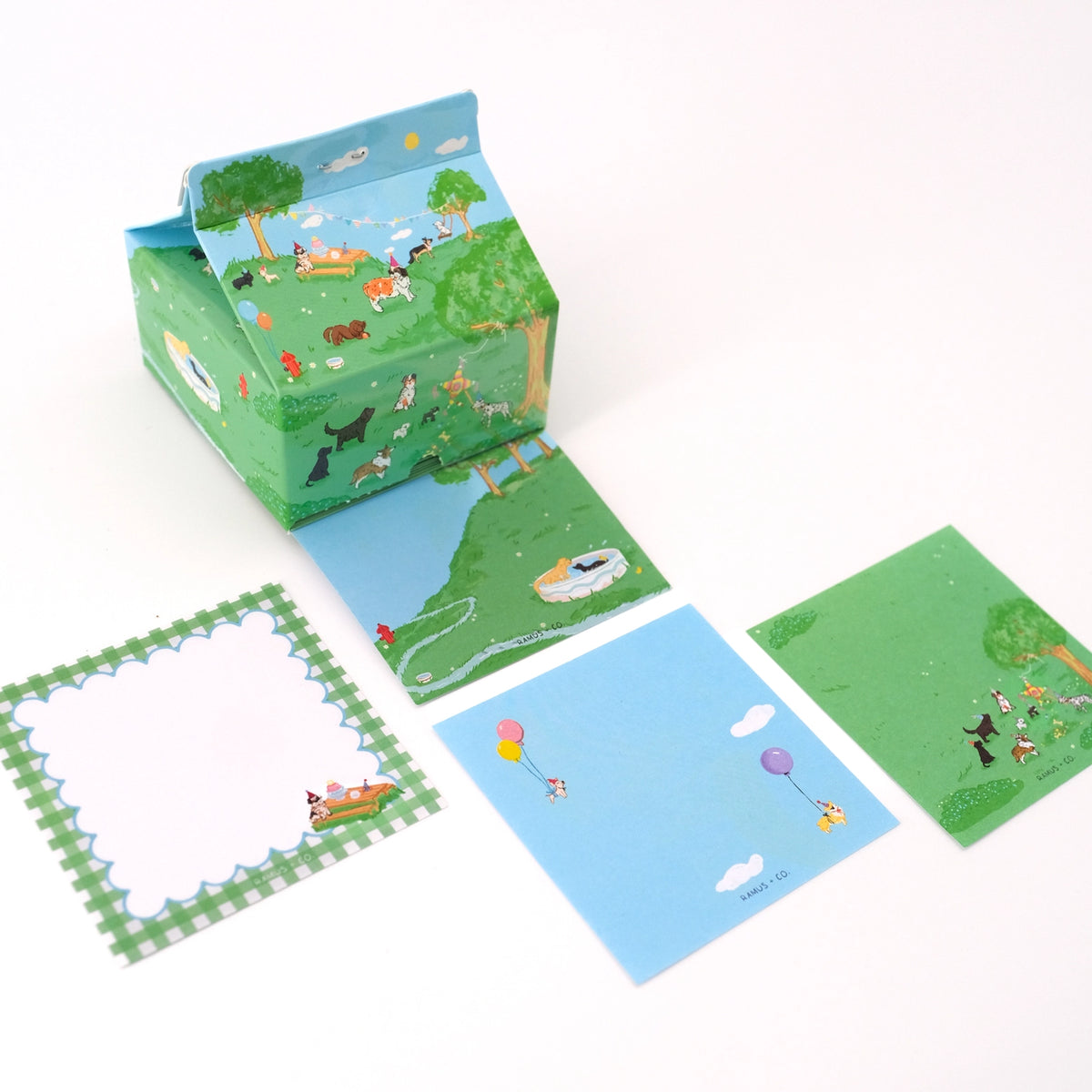 Ramus &amp; Co. - Doggy Days Note Carton

Fresh notes, served daily! This Ramus &amp; Co. mini carton comes filled with 200 handy 3×3 inch paper notes (in four different designs!), perfect for quick lists, messages, and bright ideas.

Simply remove the perforated door on the front for quick access whenever inspiration strikes. Equal parts practical and gift-able, it’s a cheerful addition to any desk, kitchen counter, or workspace!

4 x 4 inch note carton holder
(200) 3 x 3 inch paper notes
4 unique note des