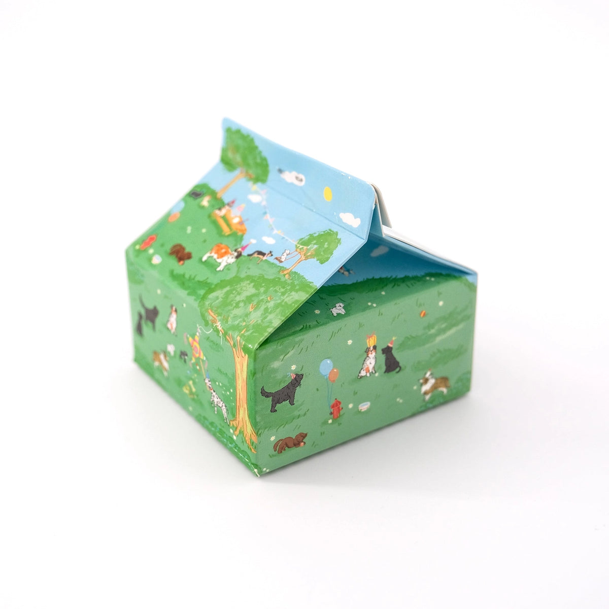 Ramus &amp; Co. - Doggy Days Note Carton

Fresh notes, served daily! This Ramus &amp; Co. mini carton comes filled with 200 handy 3×3 inch paper notes (in four different designs!), perfect for quick lists, messages, and bright ideas.

Simply remove the perforated door on the front for quick access whenever inspiration strikes. Equal parts practical and gift-able, it’s a cheerful addition to any desk, kitchen counter, or workspace!

4 x 4 inch note carton holder
(200) 3 x 3 inch paper notes
4 unique note des
