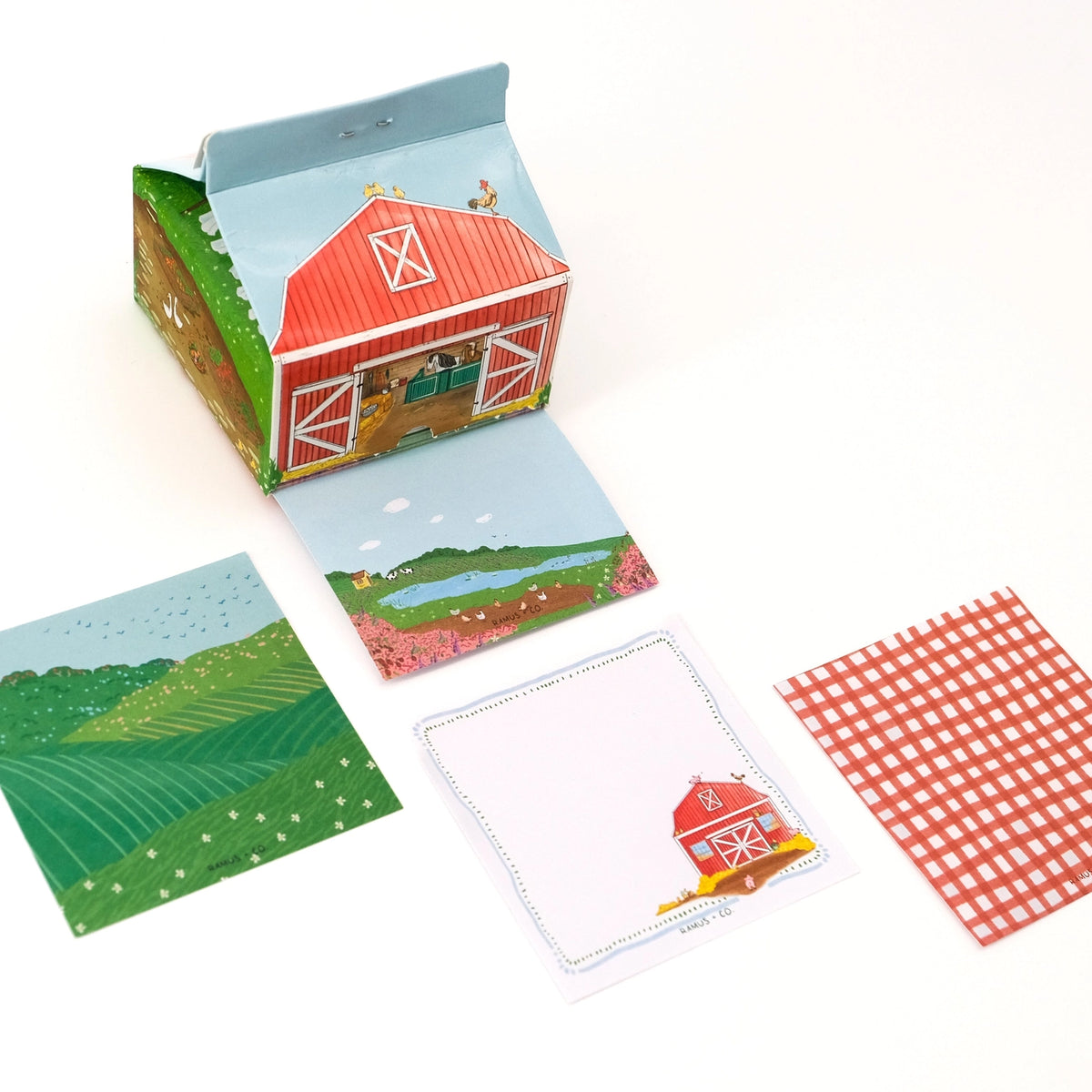 Ramus &amp; Co. - Farm Life Note Carton

Fresh notes, served daily! This Ramus &amp; Co. mini carton comes filled with 200 handy 3×3 inch paper notes (in four different designs!), perfect for quick lists, messages, and bright ideas.

Simply remove the perforated door on the front for quick access whenever inspiration strikes. Equal parts practical and gift-able, it’s a cheerful addition to any desk, kitchen counter, or workspace!

4 x 4 inch note carton holder
(200) 3 x 3 inch paper notes
4 unique note desi