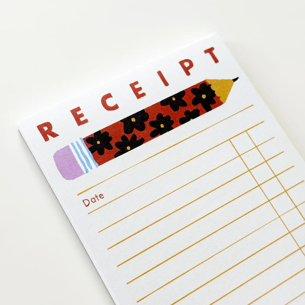 Fun long notepad with art by Karen Schipper.

4.25" x 8.75"
50 sheets
Cardboard backing.
Artwork property of Karen Schipper