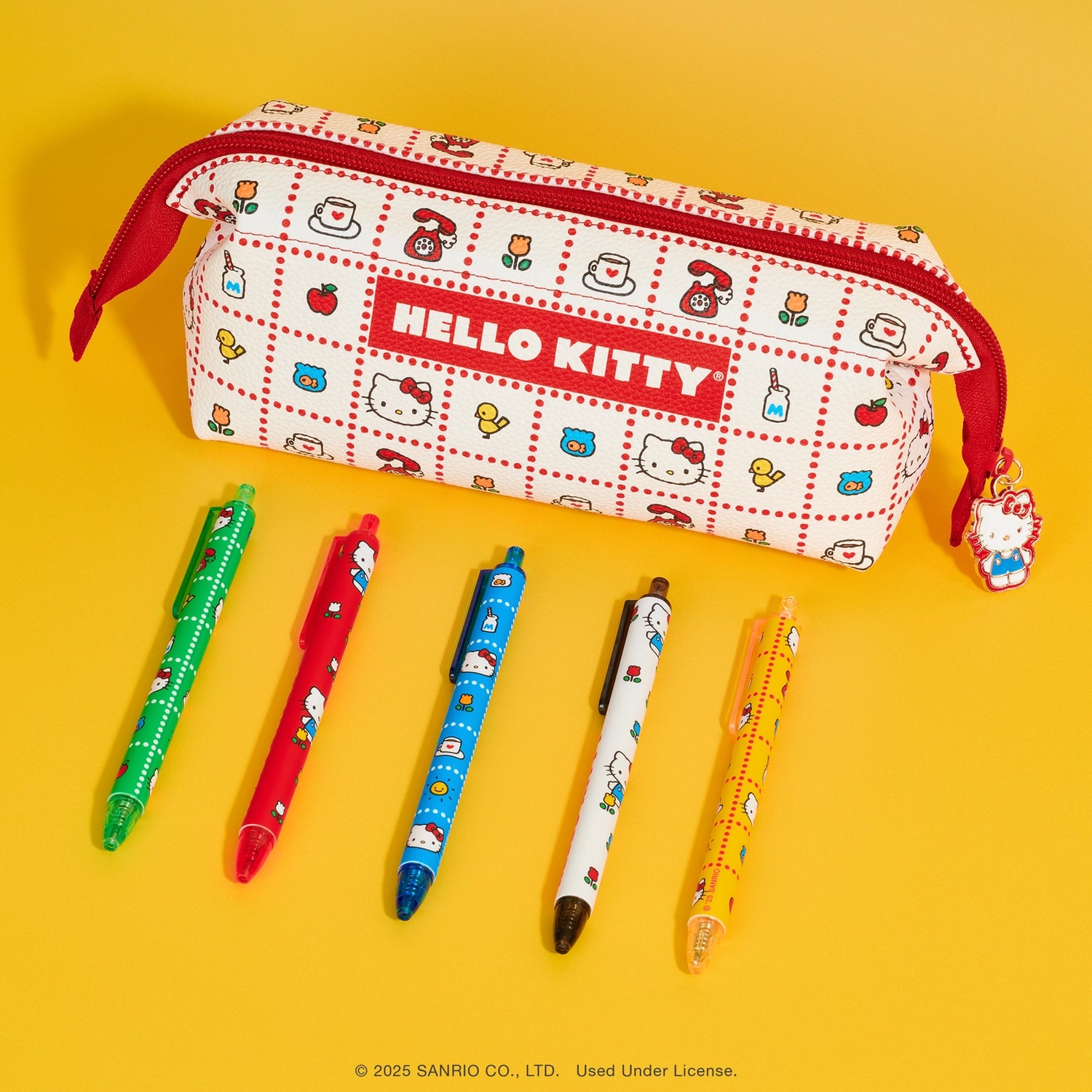 Meet your new favorite stationery essential! Featuring a vibrant, retro-inspired Hello Kitty pattern, this perfectly sized pouch is the ideal home for your pens, pencils, and any other small stationery items. The smooth-glide zipper keeps everything secure, but the true showstopper is the irresistible Hello Kitty-shaped zipper charm! Whether you’re a student, a Hello Kitty fan, or just looking to add a touch of fun to your organization, this pouch is a total game-changer.&nbsp;

© 2025 SANRIO CO., LTD. Used