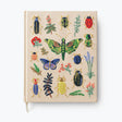 Our embroidered sketchbook is a large, hardcover journal with 108 unlined pages of thick paper perfect for sketching, drawing, and journaling. The cover is wrapped in cream book cloth and embroidered with the beetles and bugs of our Curio print with metallic gold accents. An attached grosgrain ribbon bookmark will save your place.