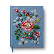 Our embroidered sketchbook is a large, hardcover journal with 108 unlined pages, perfect for sketching, drawing, and journaling. The cover is wrapped in blue book cloth and embroidered with our Gracie florals. Inside, an attached grosgrain ribbon bookmark will save your place.