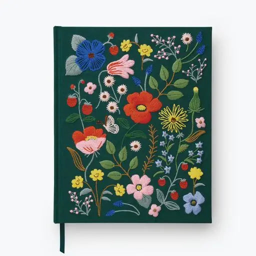 Our embroidered sketchbook is a large, hardcover journal with 108 unlined pages of thick paper perfect for sketching, drawing, and journaling. The cover is wrapped in dark green book cloth and embroidered with our Strawberry Fields florals, and an attached grosgrain ribbon bookmark will save your place.