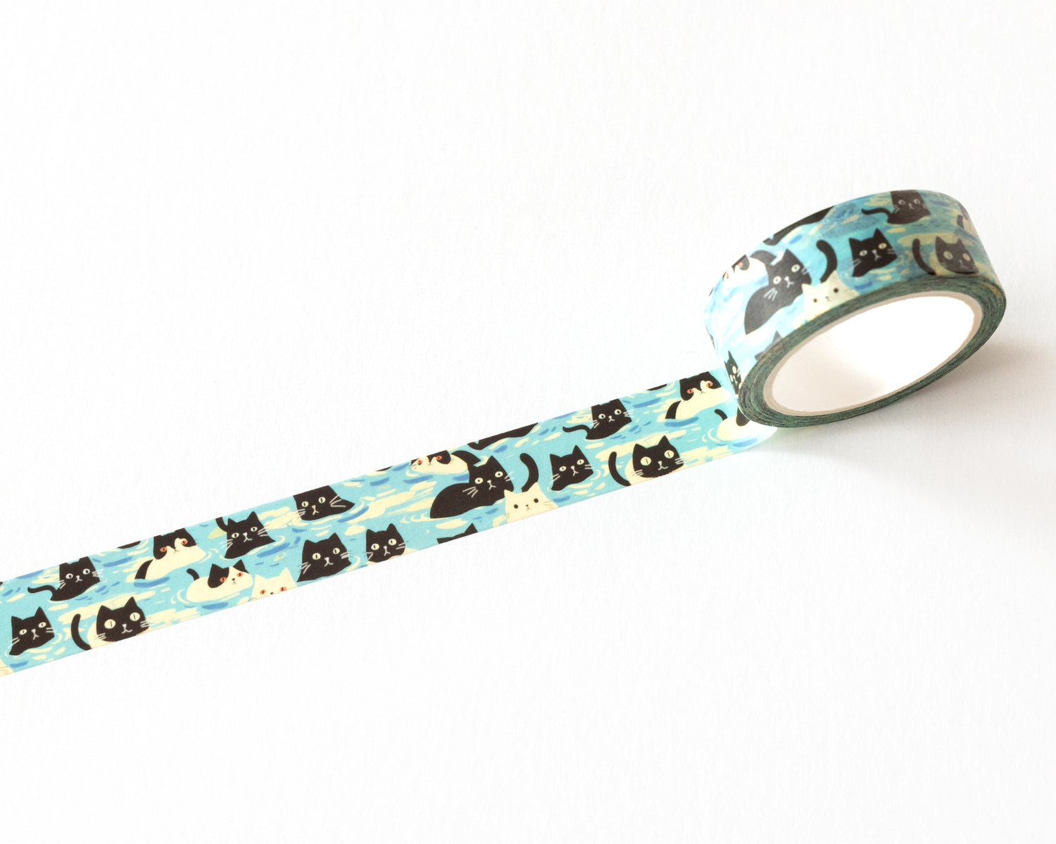 Decorative washi tape featuring playful illustrated cats in a repeating pattern on a soft blue background. Perfect for planners, journals, gift wrapping, scrapbooking, and creative projects. Easy to tear, repositionable, and residue-free.

🌈 Key Features:

Dimensions: 15mm wide x 10 meters (32.8 feet) in length&nbsp;
Contains: 1 washi tape roll

High-quality washi tape material
Easy to tear and reposition
Perfect for scrapbooking, journaling, and crafts