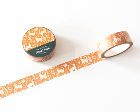 Celebrate your love for cats with our Whimsical Cats Washi Tape. Featuring an adorable design of playful cats amidst floral patterns on a warm mustard background, this washi tape is perfect for adding a touch of feline charm to your scrapbooking, journaling, card making, and other DIY projects. Measuring 10 meters in length, this washi tape is durable and easy to tear, making it ideal for both kids and adults. The delightful cat design is sure to bring joy and creativity to any project.