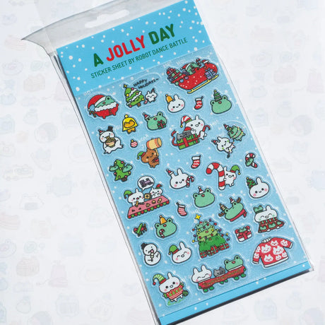This is part of a new series of sticker sheets that feature different "days".

There are 33 individual glitter stickers on the sheet full of holiday joy!

They are plastic stickers on a frosted plastic sheet with a backing card and packaging that's ready to display.