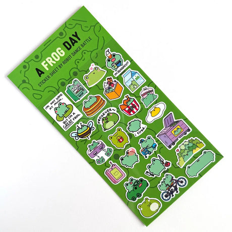 This is part of a new series of sticker sheets that feature different "days".

There are 25 individual stickers on the sheet full of FROGS.

They are vinyl stickers on a clear plastic sheet with a backing card. The bag has a hanging hole for retail display.

The whole packaging is 3.8 x 8.75" and is ready to hang.
The sticker sheet is 3.75 x 5.8"