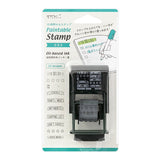 This fun rotating stamp by Midori allows you to choose from several designs and patterns that come with each stamp. The rotating stamp comes with an ink pad to be installed into the stamp before beginning to use it. Lock buttons on the side of the stamp allow you to lock the stamp into place when changing out the ink pad and when changing between designs to avoid mess.