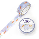 A tiny summer festival dances across this tape, goldfish drifting like living lanterns while fireworks bloom above them in soft bursts of color. The light blue background feels like evening sky over a festival pond, where goldfish glide lazily beneath shimmering reflections and the night hums with celebration.