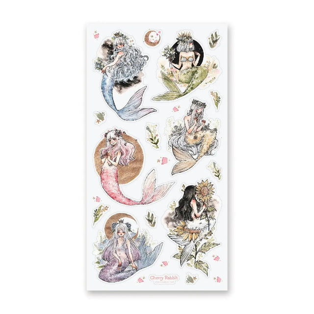 Magical mermaids surrounded by pieces of nature!

Art by @cherririi

Top Coating: None
Adhesive Layer: Paper
Backing Layer: Clear PET
6.69" x 3.54".
Weight - 0.03lbs.
1 sheet included &nbsp;