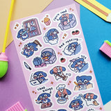 STICKII Crisis & Mocha Sticker Sheet

🐶💤 Meet Crisis & Mocha, just doing their best trying to get through the week (like us). Whether they’re starting fires while tcooking dinner, binge-watching, or just vibing in a disaster of their own making, this sheet by @xiiyta is a reminder that yes we’re all a mess but we’re an adorable mess so it’s okay or something.