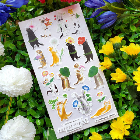 🐱🌺 With their irresistible charm, playful spirit, and endearing nature, it’s hard not to love these fluffy darlings. Featuring kitties amidst nature, holding their favorite flowers and plants, @davidcookslove captures the essence of feline grace and playfulness with these illustrations that are just the cat’s meow.