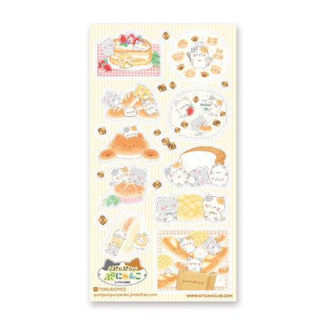🍞🐱 Soft, sweet, and baked with pure cuteness! @illustratortokudome’s kawaii kitties are lounging on fluffy pancakes, snuggling in fresh baguettes, and baking like purr-fect pros. Every buttery pastry and sugar-dusted treat comes with a tiny paw print of charm.

Art by: @illustratortokudome

Top Coating: None
Adhesive Layer: Paper
Backing Layer: Clear PET
6.69" x 3.54".
Weight - 0.03lbs.
1 sheet included&nbsp;