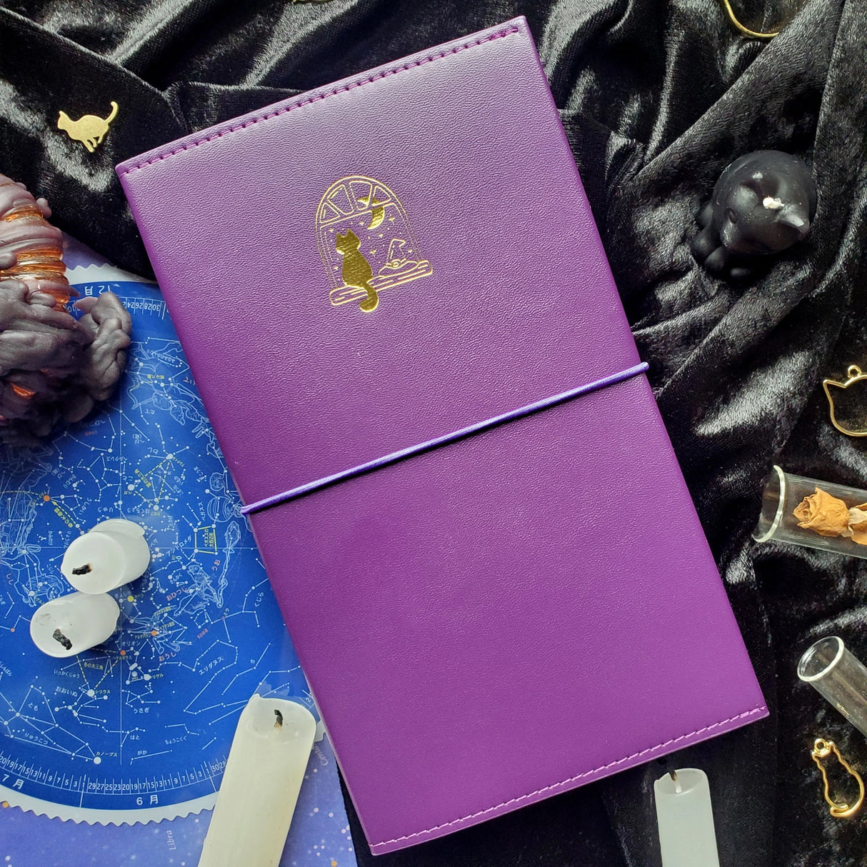 A little moonlit magic for your sticker collection! 🪄 With its celestial vibe and charming feline familiar, our brand new binder will keep your sticker sheets safely tucked away and beautifully organized. Perfect for cozy journaling nights, planning under the moonlight, and growing your sticker stash in style. ✨

Each organizer features a vegan leather cover with a shimmering gold foil emblem and holds up to 48 sticker sheets across 24 pages.

🌙🐈 Moonlit Cat  – Rich violet with a golden cat gazing out a 