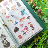 Leap into ribbit-ing sticker adventures with our brand new sheets organizer! 🐸 This fun binder is ready to keep your collection neat, safe, and easy to browse whenever inspiration strikes. Whether you're planning your next creative spread or settling in for a cozy sticker session, it’s the perfect little lily pad for your favorite sticker sheets to land. ✨

The organizer features a vegan leather cover with a shimmering gold foil emblem and holds up to 48 sticker sheets across 24 pages.

🐸🌿 Woodland Frog 